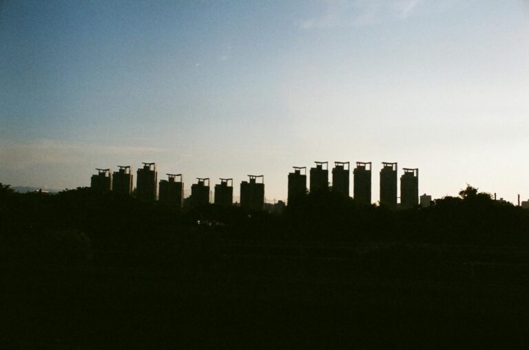High rise buildings in town in evening